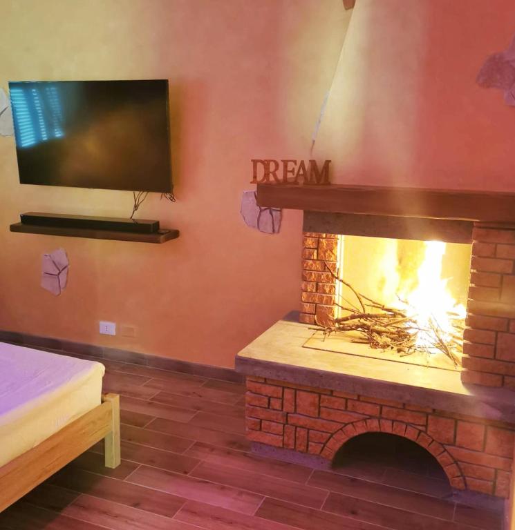 TV a/nebo společenská místnost v ubytování COUNTRYSIDE SUITE