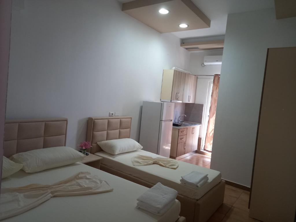 Postel nebo postele na pokoji v ubytování Bar Restorant Hotel Altini