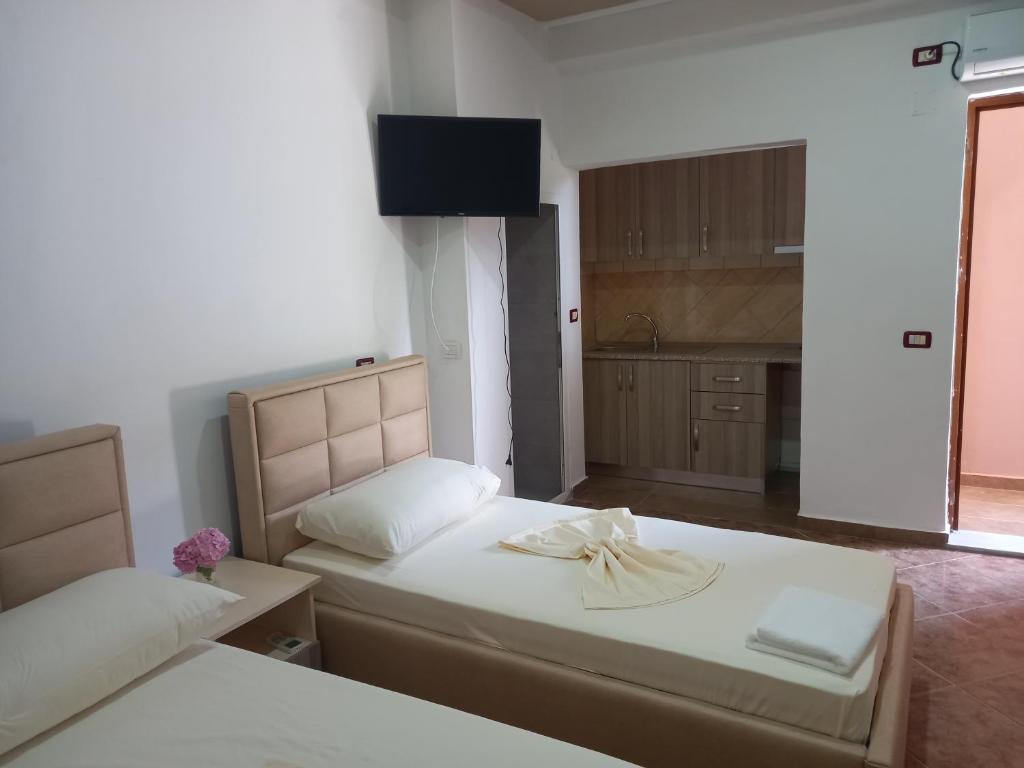 Postel nebo postele na pokoji v ubytování Bar Restorant Hotel Altini