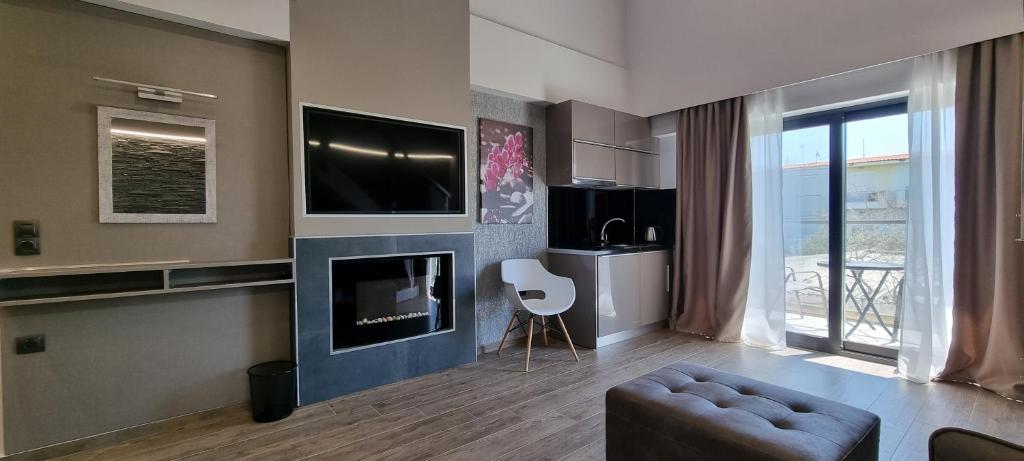 TV a/nebo společenská místnost v ubytování LUXSUITES
