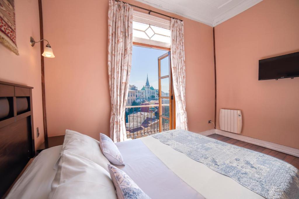 Cama ou camas em um quarto em Hotel Boutique Casa Vander