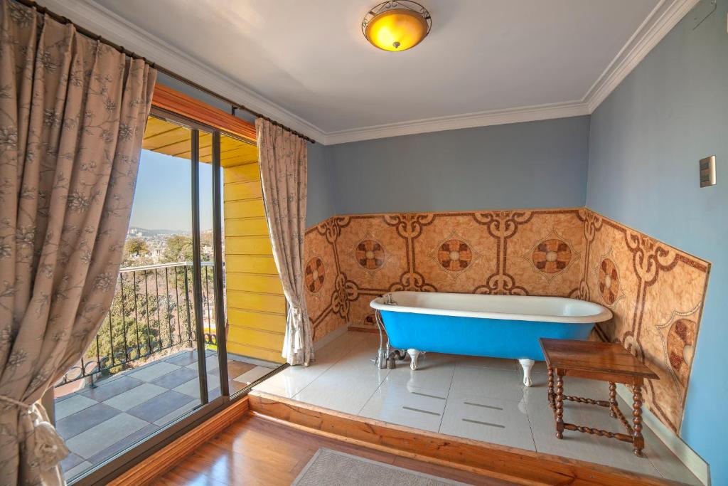 Uma área de estar em Hotel Boutique Casa Vander