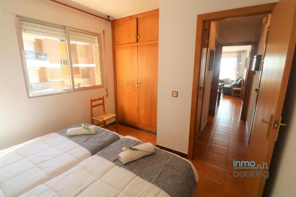 Postel nebo postele na pokoji v ubytování Costar Dor Cambrils, en primera linea