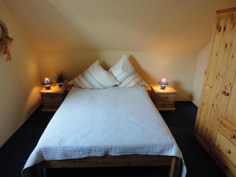 Postel nebo postele na pokoji v ubytování Friesenstern