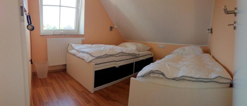 Postel nebo postele na pokoji v ubytování Sieloase