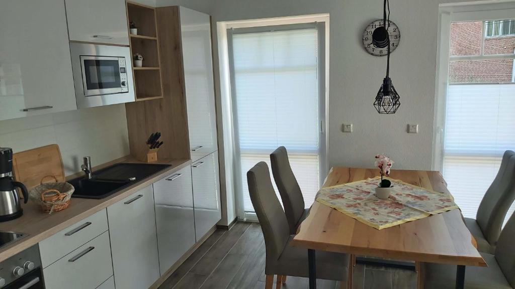 Kuchyň nebo kuchyňský kout v ubytování Grachtendrööm