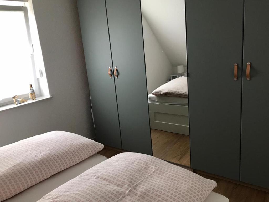 Postel nebo postele na pokoji v ubytování Mühlenblick