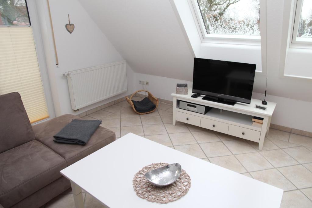 TV a/nebo společenská místnost v ubytování Nordlicht Greetsiel