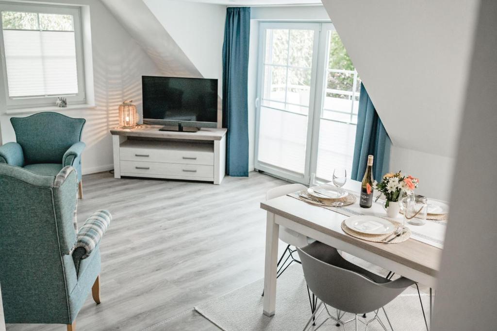 TV a/nebo společenská místnost v ubytování Friesenlounge