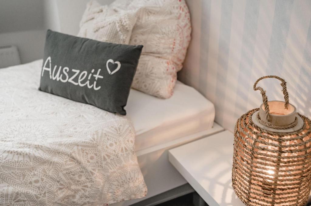 Postel nebo postele na pokoji v ubytování Friesenlounge