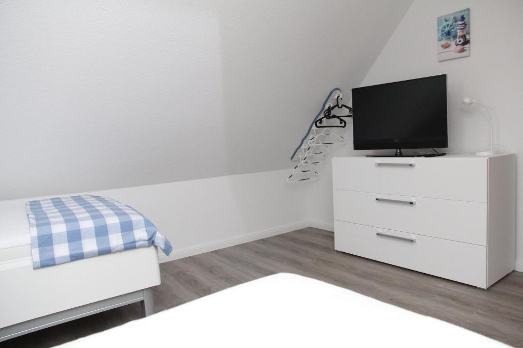 TV a/nebo společenská místnost v ubytování Friesenlounge