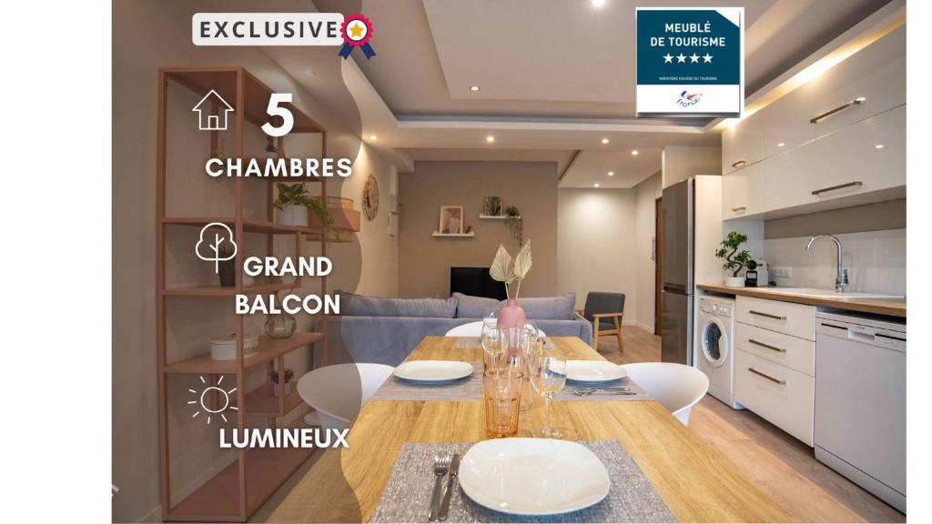 een keuken en een eetkamer met een tafel en stoelen bij "Envie Lyonnaise" Location - 10 personnes - Terrasse - WIFI Fibre optique in Lyon