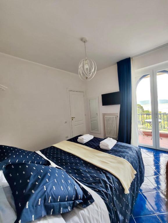 Postel nebo postele na pokoji v ubytování Residence Villa Giordano sea view Amalfi Coast