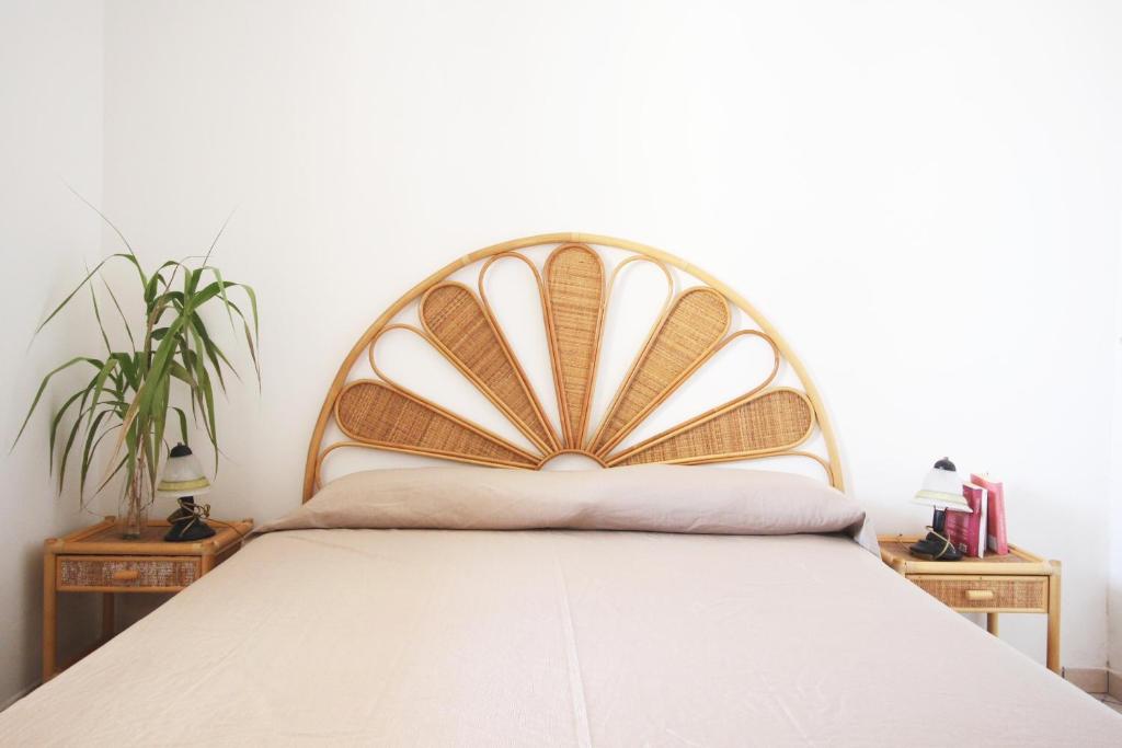 A bed or beds in a room at Casa Simone by RENTHOUSESALENTO