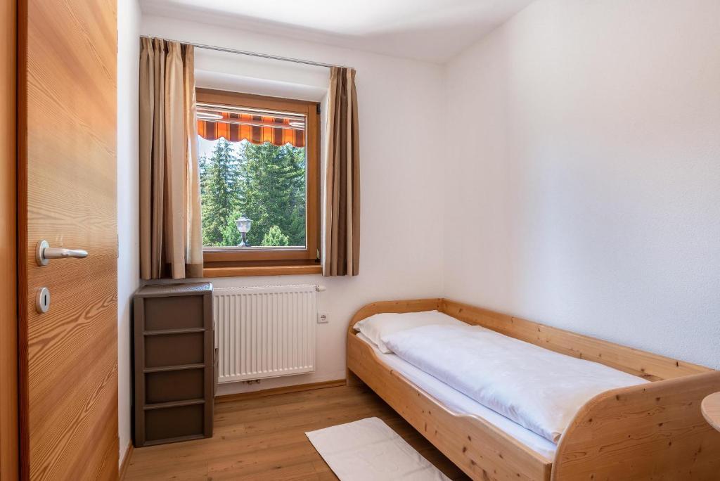 Łóżko lub łóżka w pokoju w obiekcie Ferienparadies Sabina Joch