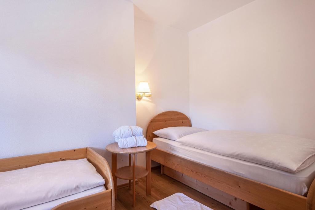 Łóżko lub łóżka w pokoju w obiekcie Ferienparadies Sabina Joch
