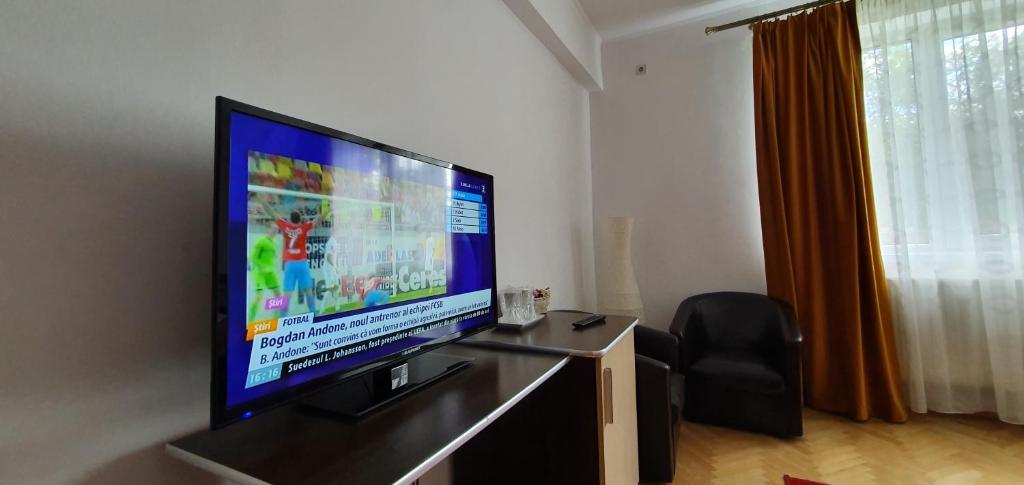 TV a/nebo společenská místnost v ubytování Vila Parc