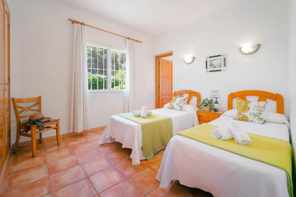 Postel nebo postele na pokoji v ubytování Villa Cinca by Villa Plus
