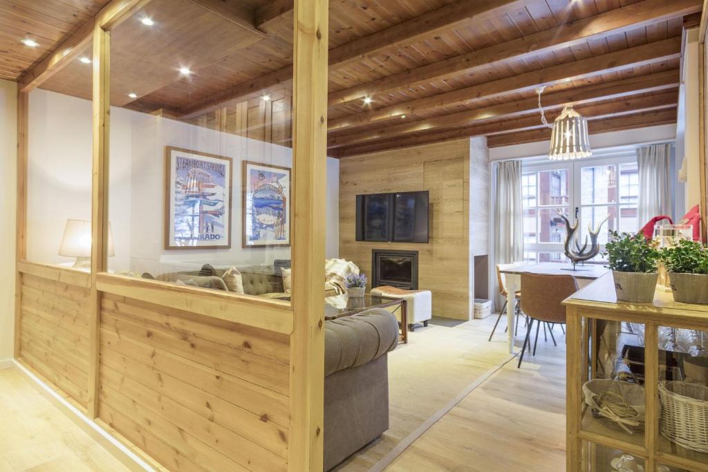 TV a/nebo společenská místnost v ubytování Luderna - Apartamento Val de Ruda A19 de Saumet