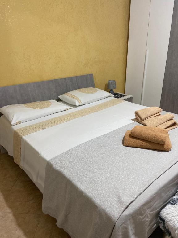 Posteľ alebo postele v izbe v ubytovaní Casa vacanza Giusi