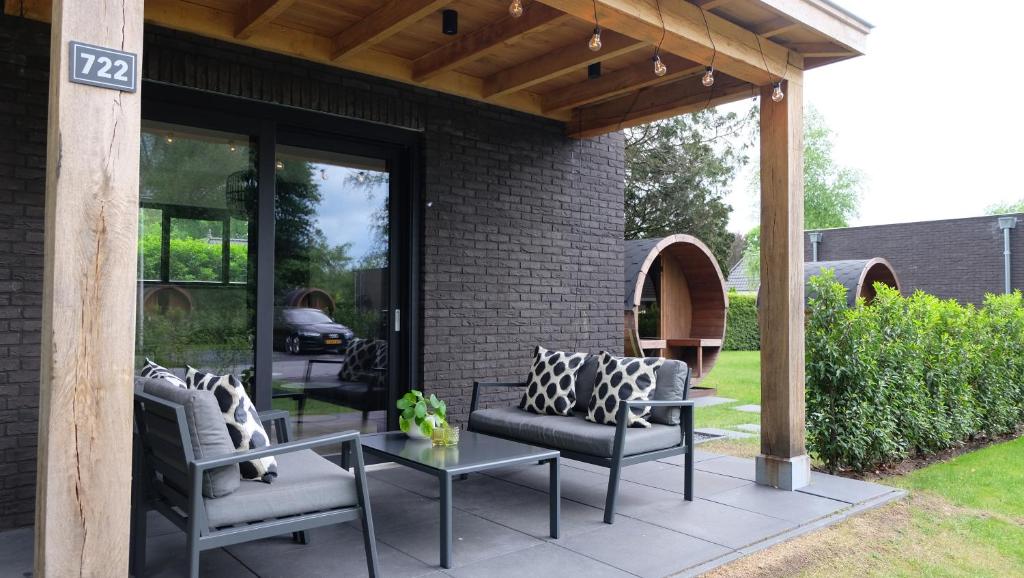 Zahrada ubytování The White Oak - Luxe 4 persoons bungalow met prive sauna