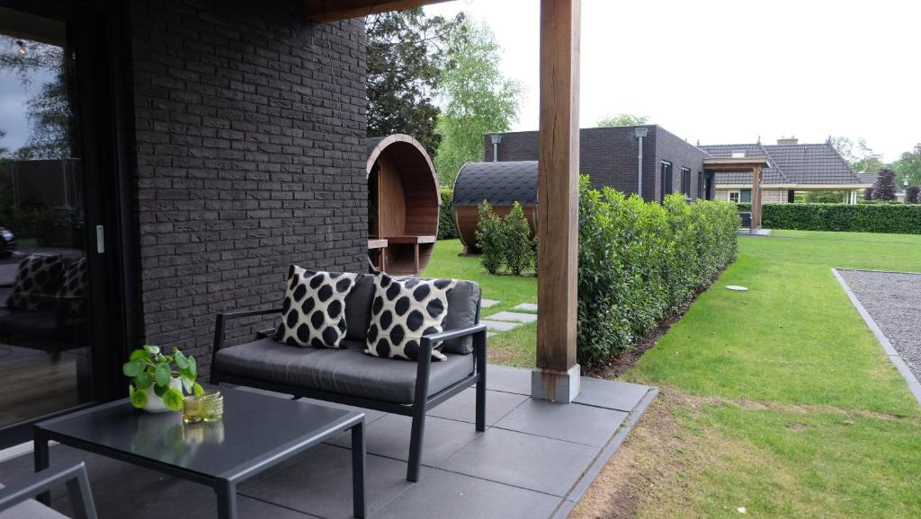 Zahrada ubytování The White Oak - Luxe 4 persoons bungalow met prive sauna