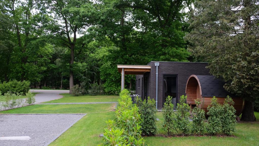 Zahrada ubytování The White Oak - Luxe 4 persoons bungalow met prive sauna