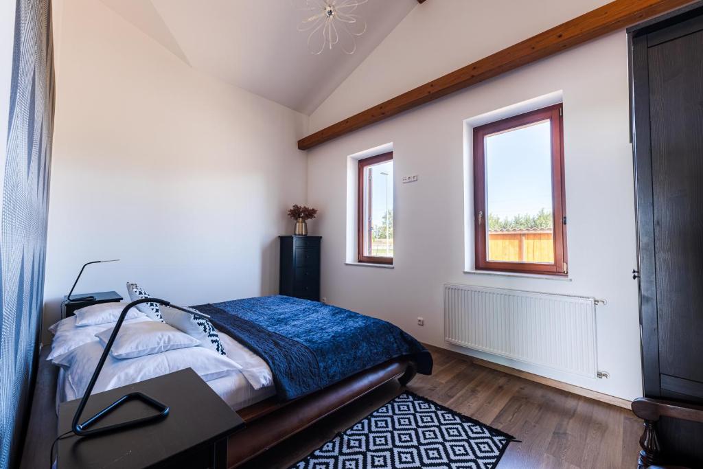 Łóżko lub łóżka w pokoju w obiekcie Balaton View Apartment