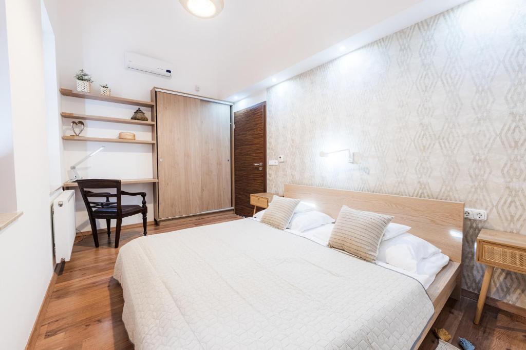Łóżko lub łóżka w pokoju w obiekcie Balaton View Apartment