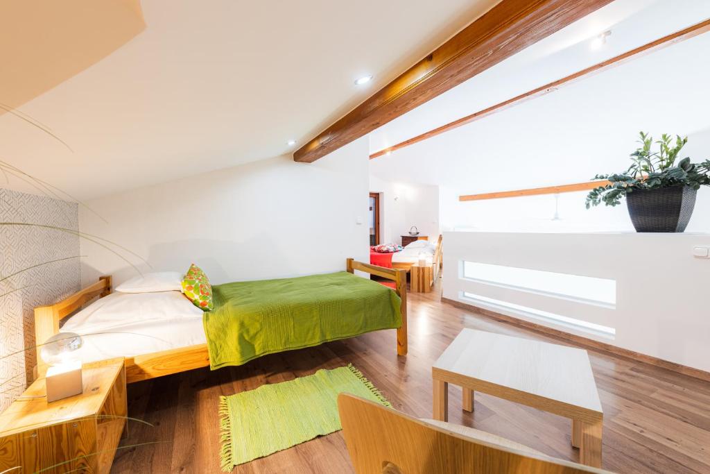 Łóżko lub łóżka w pokoju w obiekcie Balaton View Apartment