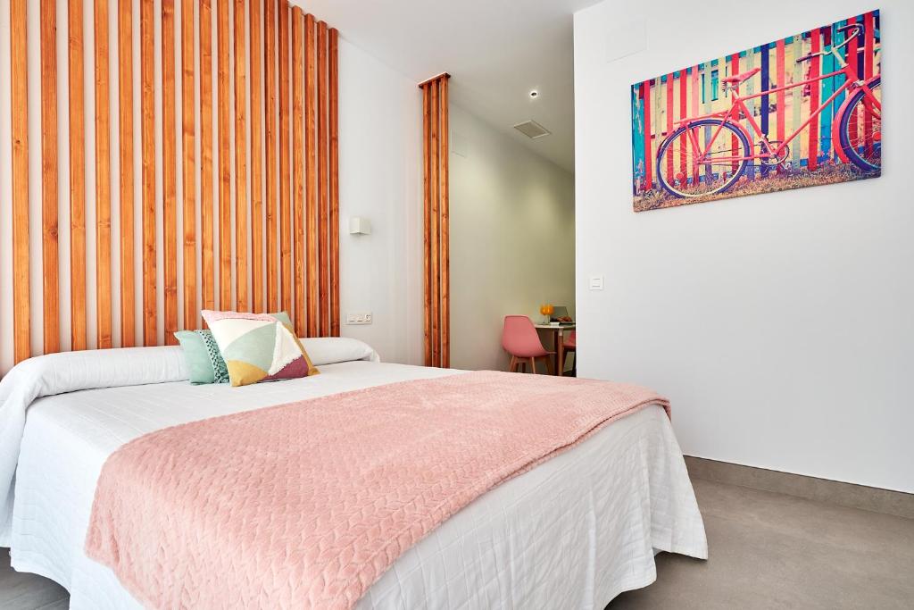 Posteľ alebo postele v izbe v ubytovaní 9 NIDOS Céntrica Suites - Nuevo