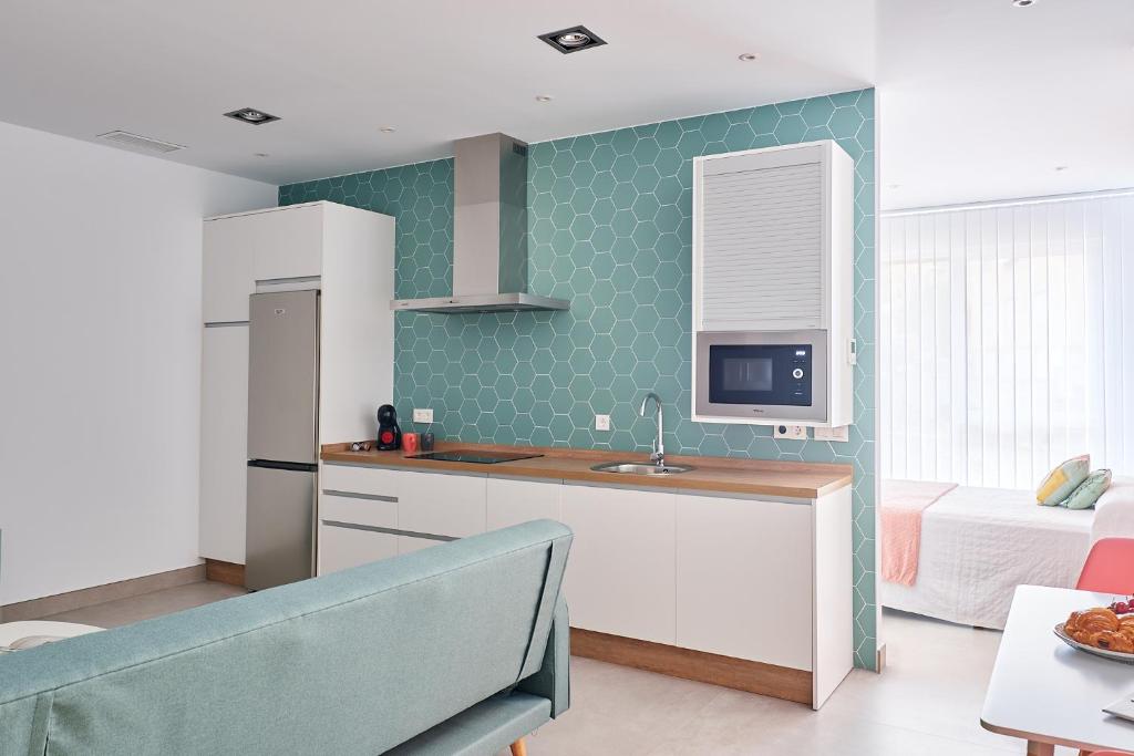 Kuchyňa alebo kuchynka v ubytovaní 9 NIDOS Céntrica Suites - Nuevo
