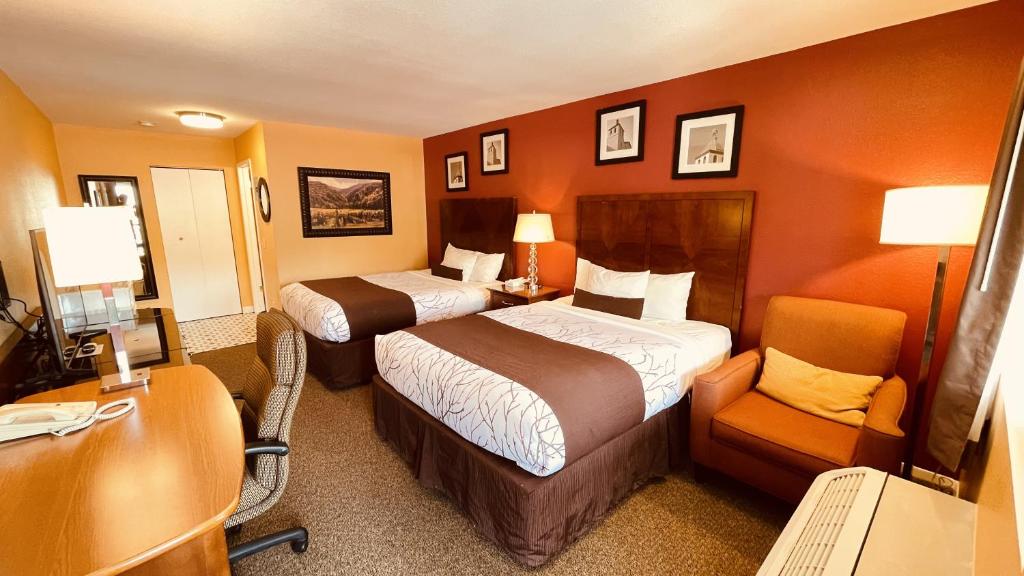 Posteľ alebo postele v izbe v ubytovaní Apple Inn Motel