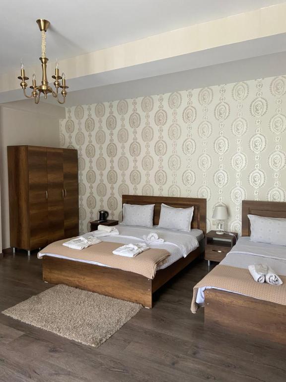 Postel nebo postele na pokoji v ubytování Borjomi Central