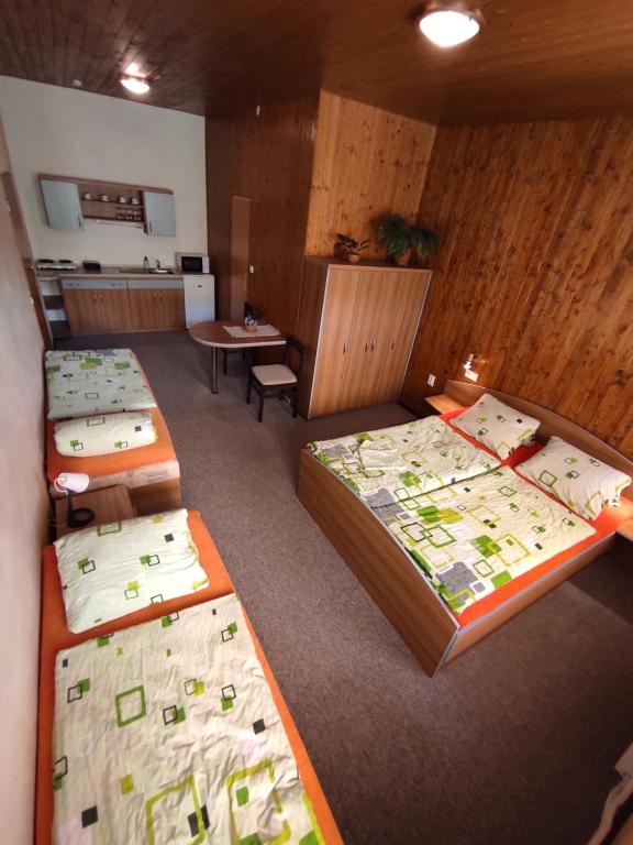 Postel nebo postele na pokoji v ubytování Apartmány Vranov
