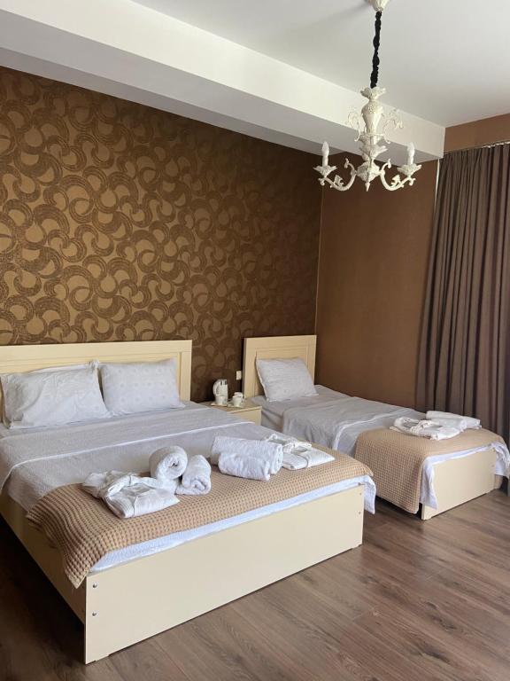 Postel nebo postele na pokoji v ubytování Borjomi Central