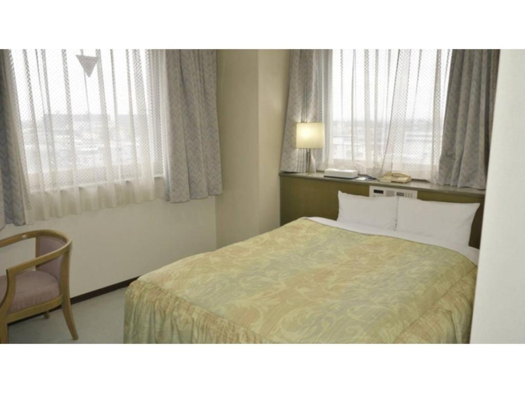 เตียงในห้องที่ Pulsesin in Kyoto - Vacation STAY 73556v