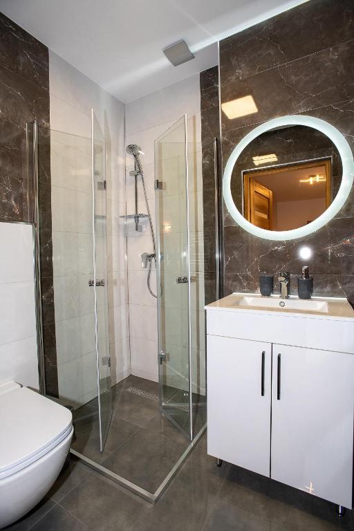 Kúpeľňa v ubytovaní Apartamenty u Bartka i Magdy