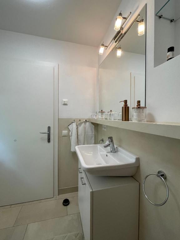 Kúpeľňa v ubytovaní Seewohnung Lucia - mit Seezugang