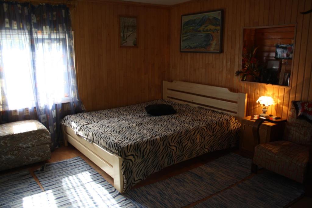 Postel nebo postele na pokoji v ubytování Садиба під Гострою