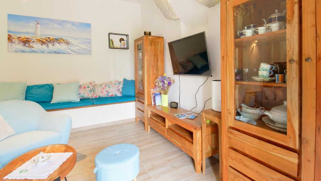 Telewizja i/lub zestaw kina domowego w obiekcie Villa Nicolara by Rent Istria