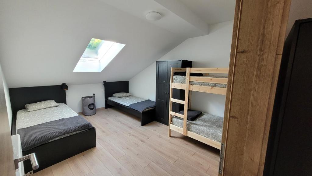 Krevet ili kreveti na sprat u jedinici u okviru objekta Apartma Krupa