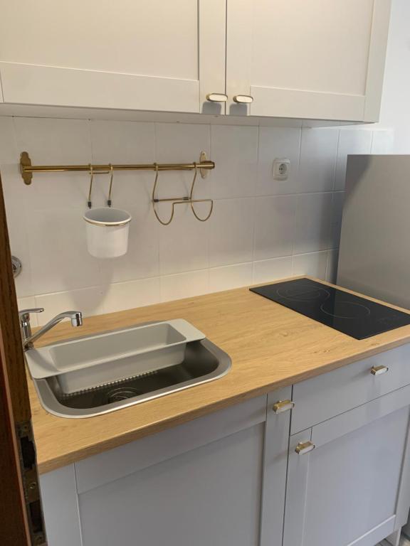 Kuchyňa alebo kuchynka v ubytovaní Apartments Villa Ohana