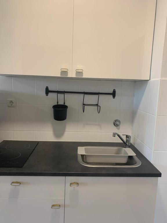 Kuchyňa alebo kuchynka v ubytovaní Apartments Villa Ohana