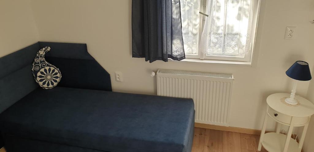 Postel nebo postele na pokoji v ubytování Penzión Emese