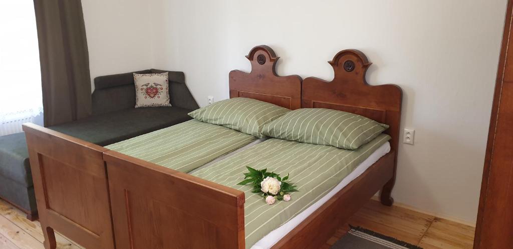 Postel nebo postele na pokoji v ubytování Penzión Emese