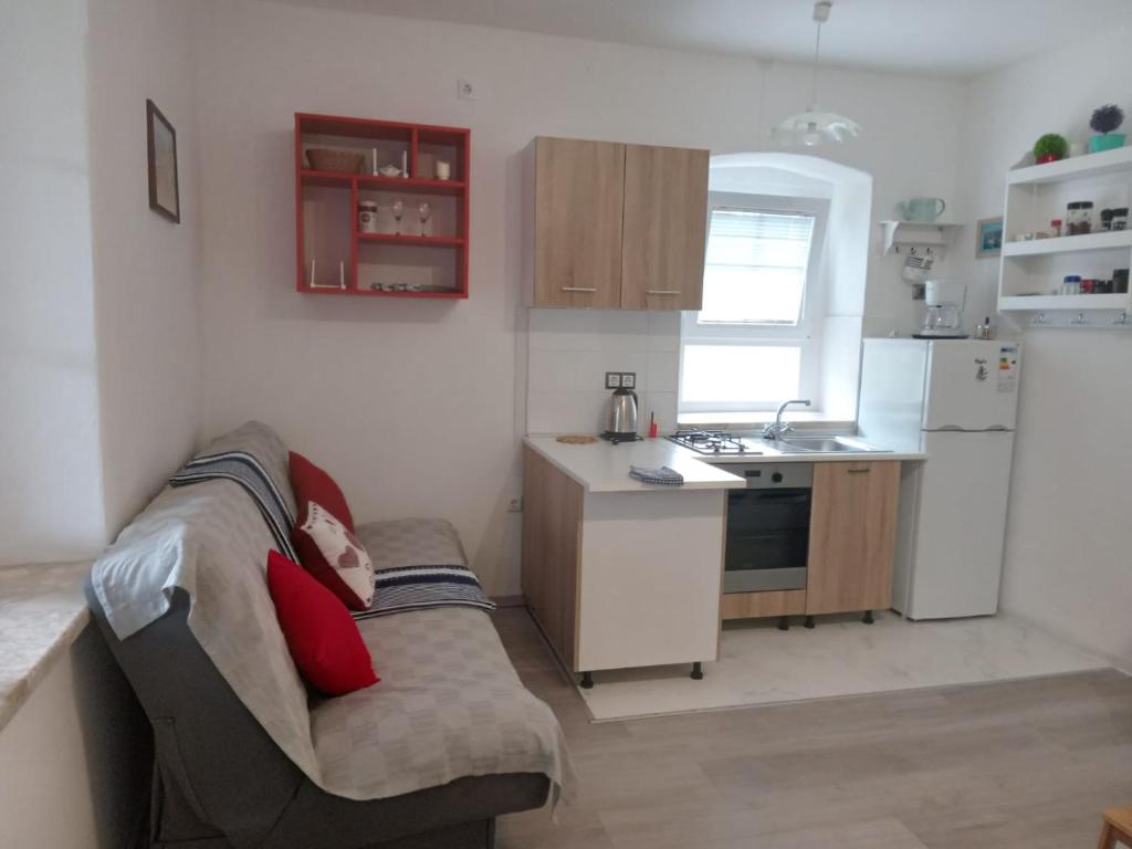 Kuchyňa alebo kuchynka v ubytovaní Kastelanic apartman