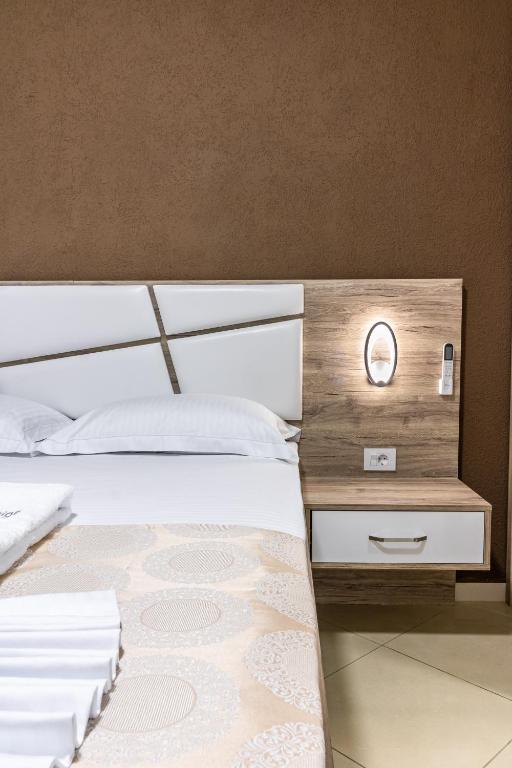 Krevet ili kreveti u jedinici u okviru objekta Apart-Hotel Prestige