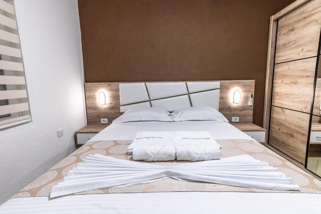 Krevet ili kreveti u jedinici u okviru objekta Apart-Hotel Prestige