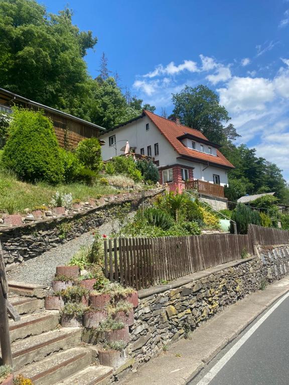 a house sitting on the side of a road at Pfefferberg in Ziegenrück